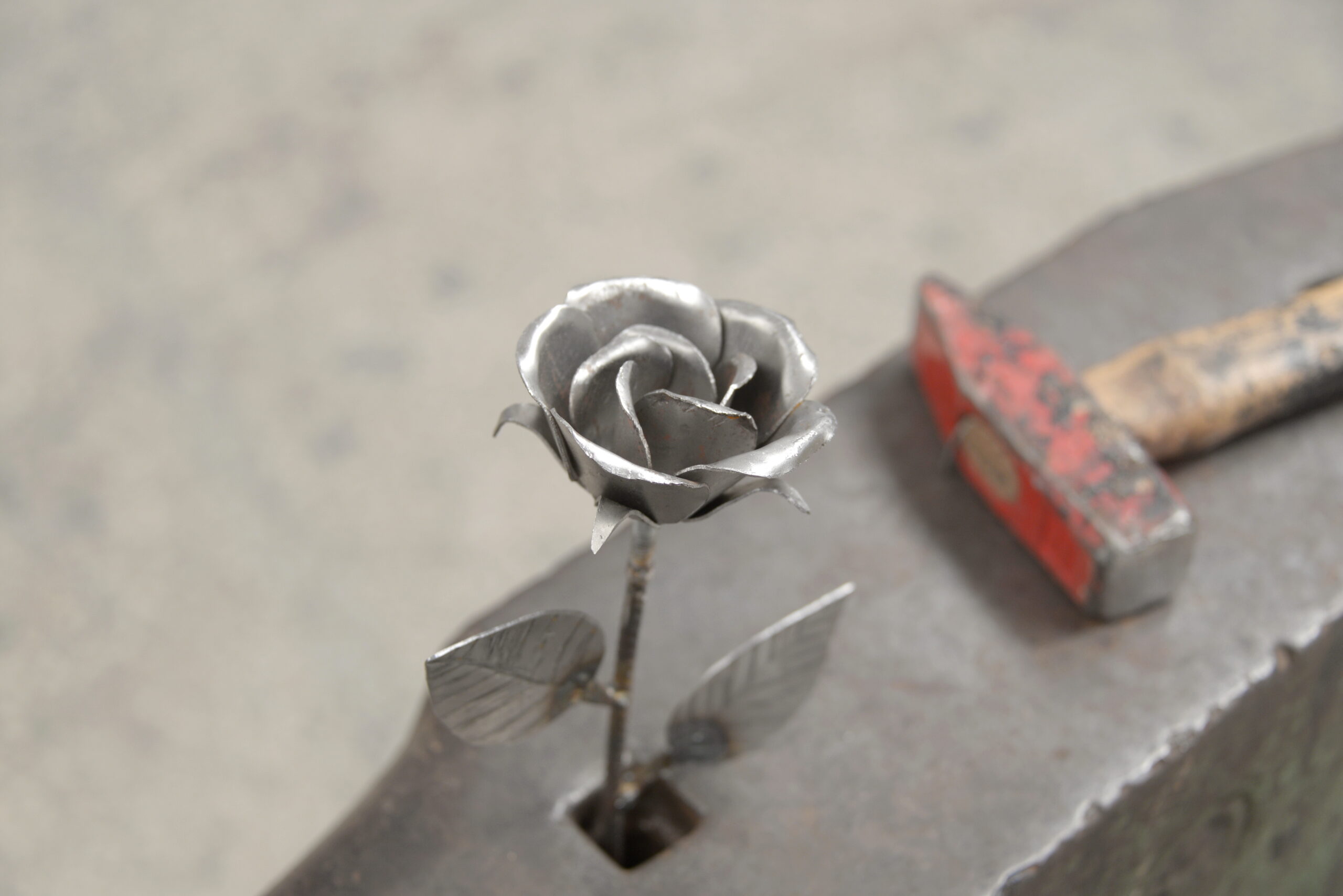 steel rose and blacksmith's hammer